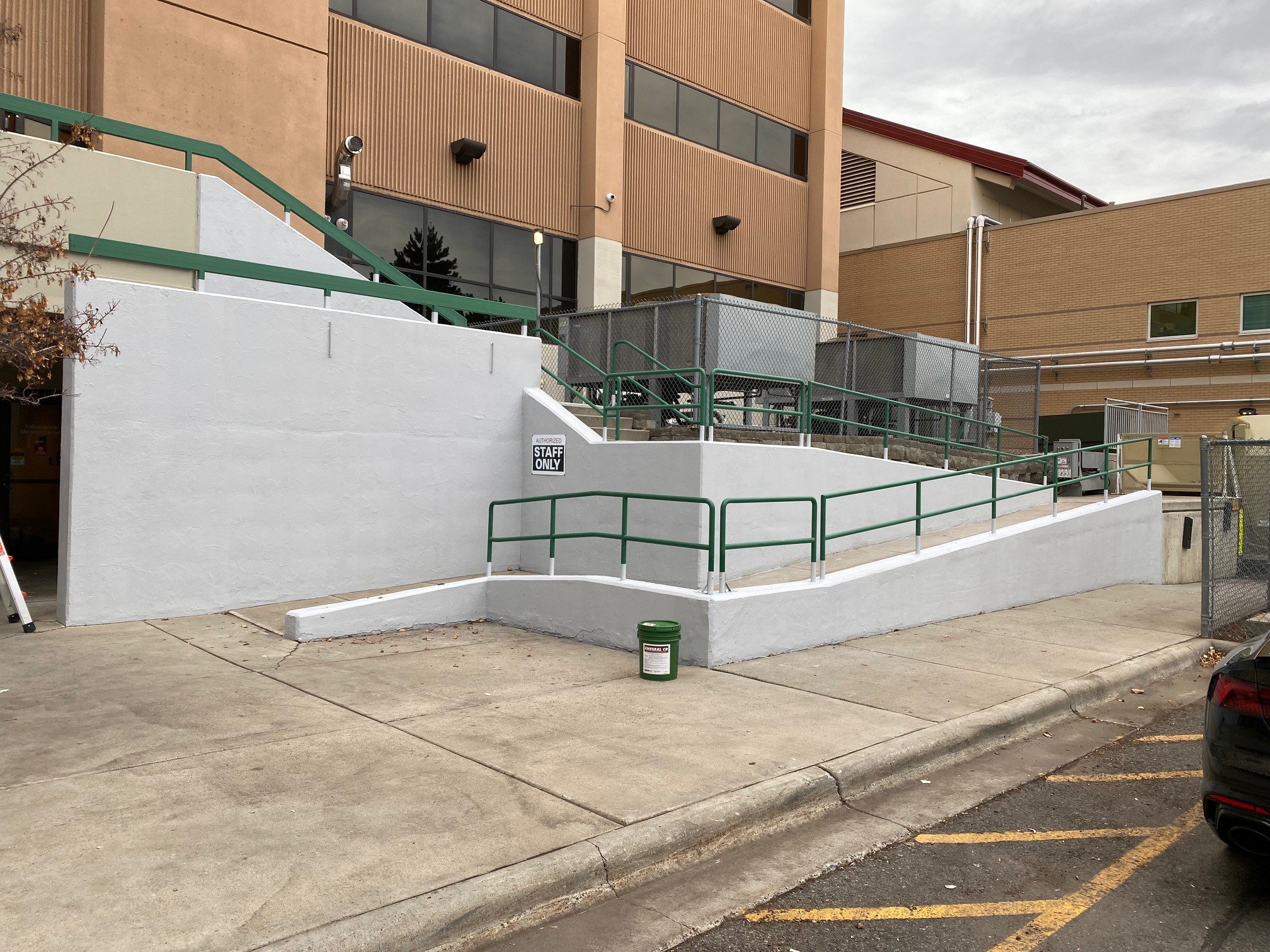 commercial entrance ramp walkway concrete retaining wall repairs